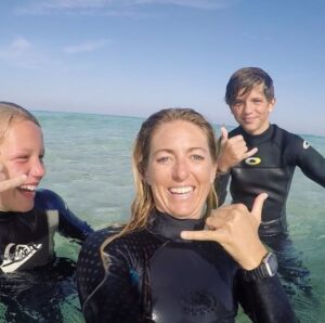 Kids surf lessons in Corralejo, Fuerteventura and Newquay, Cornwall with pro surfer and surf coach, Tehillah McGuinness